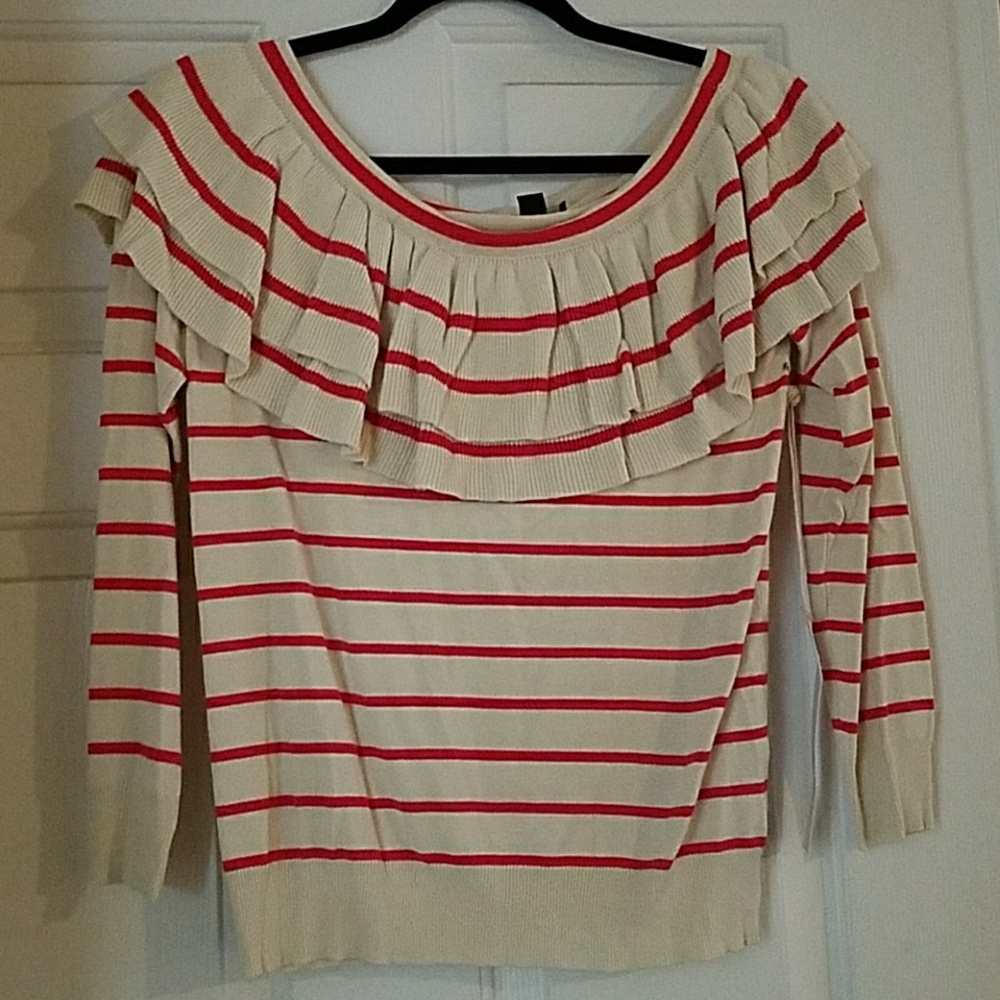 Long sleeved off the shoulder ruffled shirt